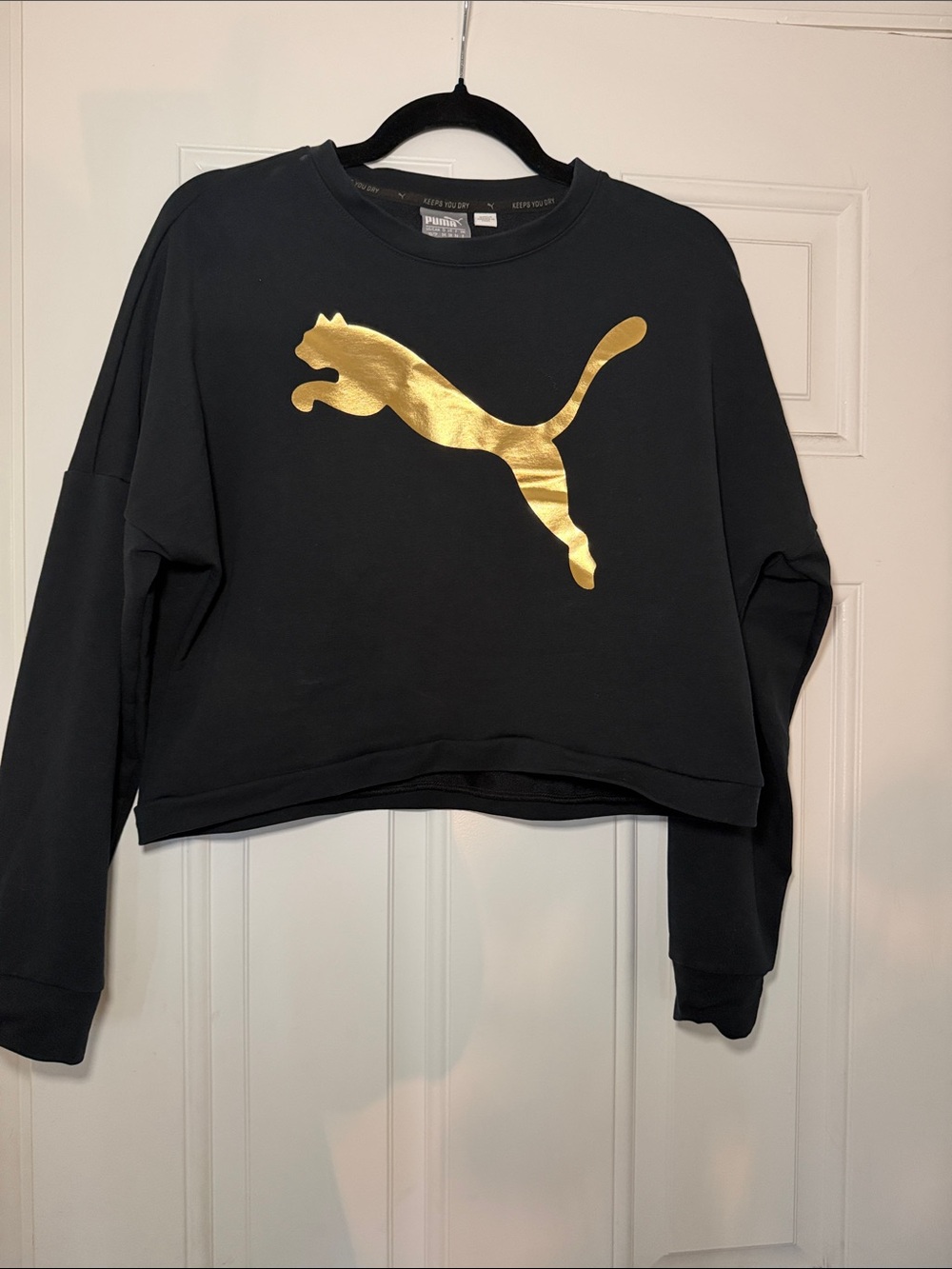 Puma Black Cropped Sweatshirt with Gold Puma Logo